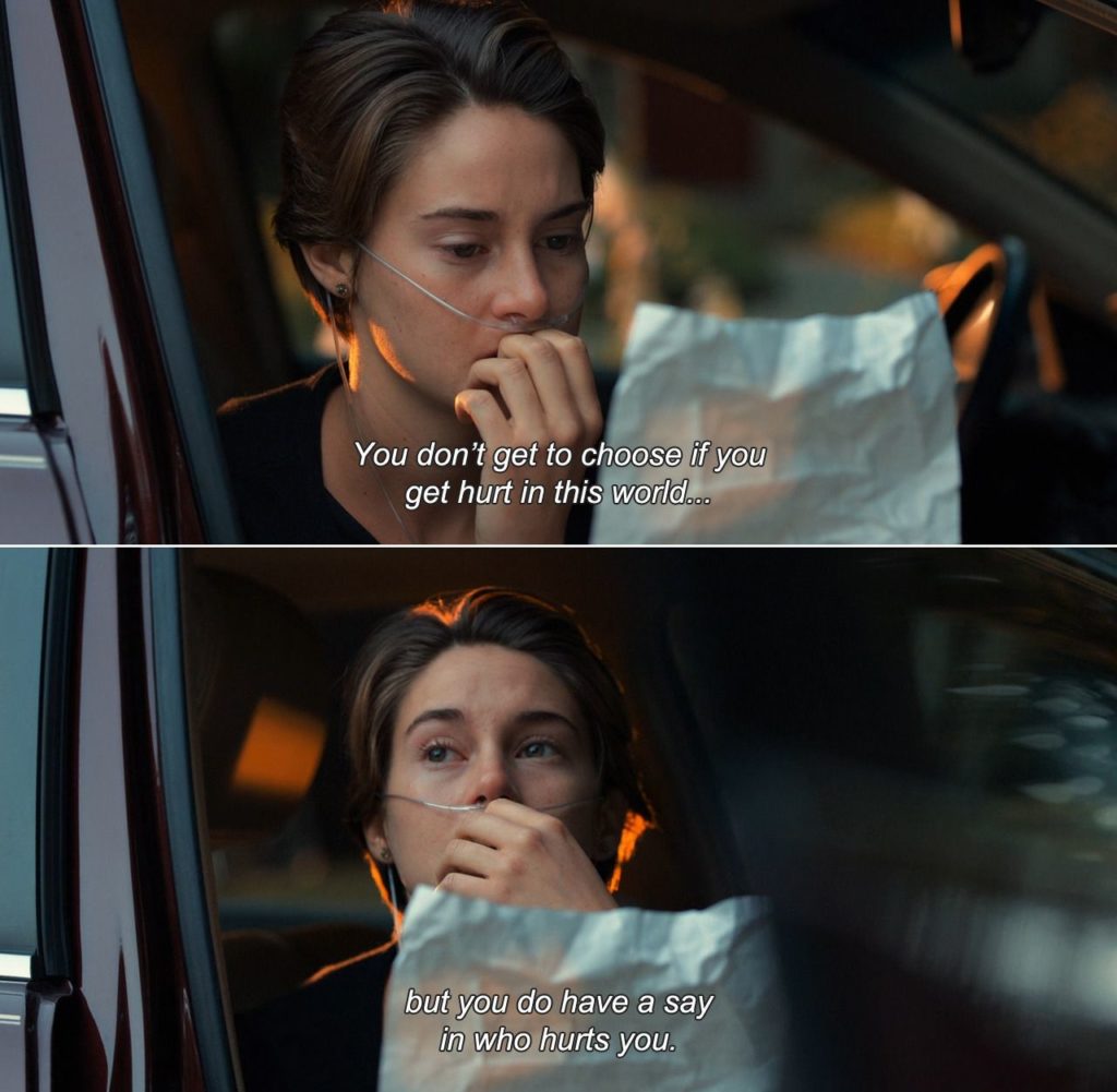 A young woman reads a letter and ponders it.