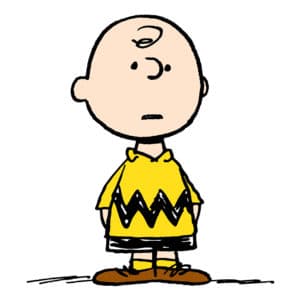 Boy in a yellow shirt standing, with a plain expression on his face from Charles Schulz's comic, Peanuts.