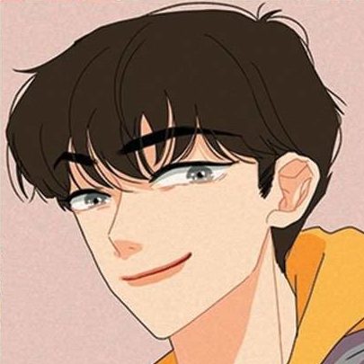 Boy smiling he has a yellow hoodie