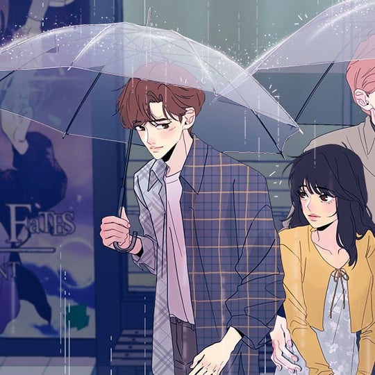 guy and girl under an umbrella