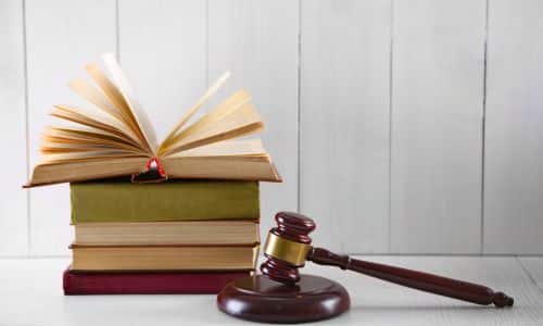stack-of-books-and-a-gavel-book-banning-press-suppression