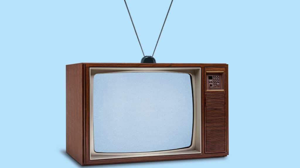 old-tv-over-a-light-blue-background
