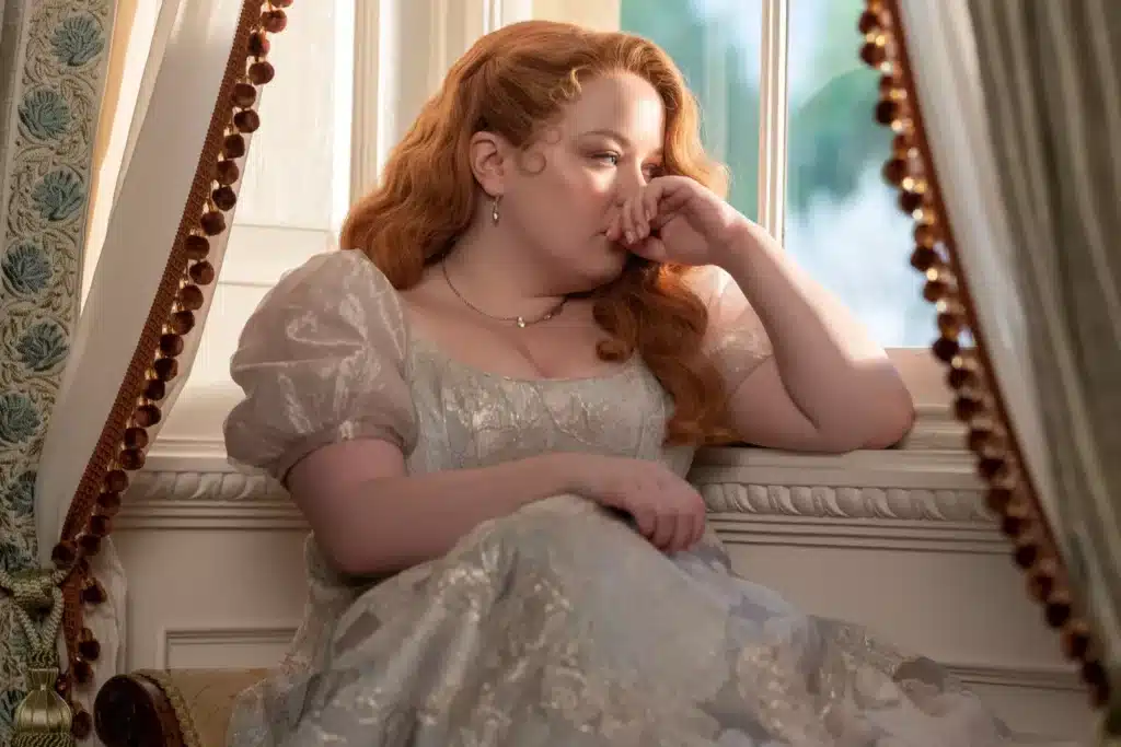 Penelope Bridgerton stares out the window.