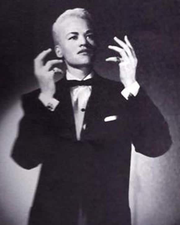 stonewall-great-leaders-black-and-white-photo-of-storme-delarverie-holding-hands-up-trans-gay