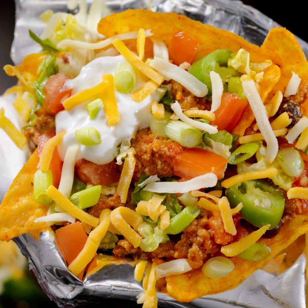Taco salad in a bag of doritos-food-truck-genre-reading