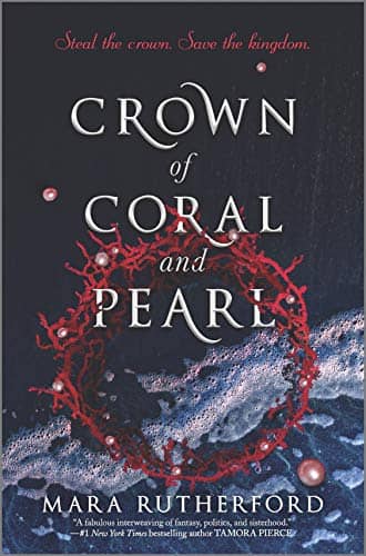 crown-of-coral-and-pearl-cover-crown-laying-on-beach