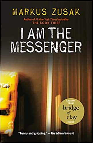 i-am-the-messenger-book-cover-markus-zusak-blurry-image-of-road-with-yellow-taxi-driving-on-left-side