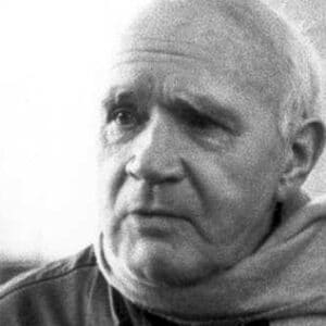 Black-and-white-candid-of-Jean-Genet-old-man-wearing-jacket-and-scarf-looking-slightly-to-his-right