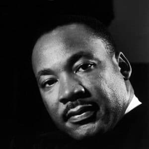 Black-and-white-headshot-of-Martin-Luther-King-Jr-with-a-resting-expression