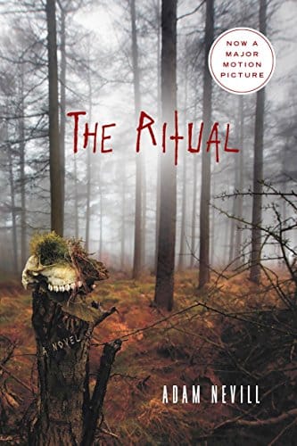 the-ritual-adam-nevil-book-cover-misty-forest-background-with-skull-on-treestump-in-foreground-horror novel