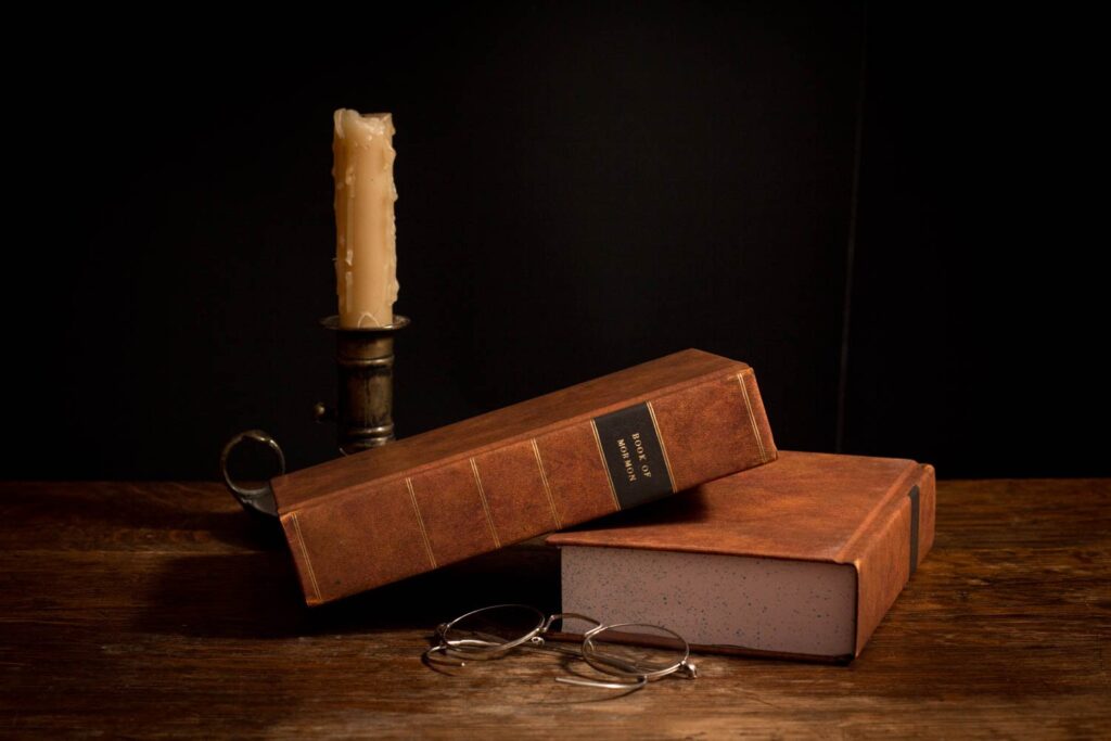 book-of-mormon-posed-by-a-candle-written-by-joseph-smith-expensive