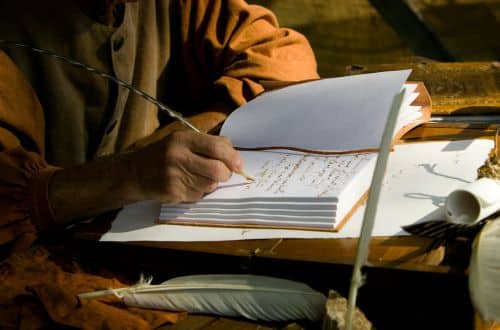 an-image-of-someone-using-a-quill-and-writing-in-a-diary-chronic-illness-graves-disease