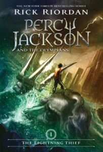 percy-jackson-cover-boy-standing-on-giant-statue-in-ocean-summer-plans-book-characters