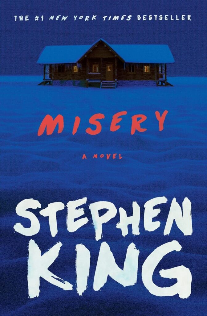 most-popular-books-from-your-birth-year-80s-edition-misery-book-cover-blue-toned-snowy-backdrop-with-house-in-distance