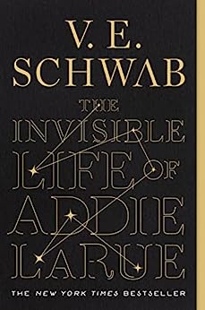 the-invisible-life-of-addie-larue-book-cover-black-background-gold-text-seven-stars-making-a-constellation-speak-now-taylor-swift-recommendations