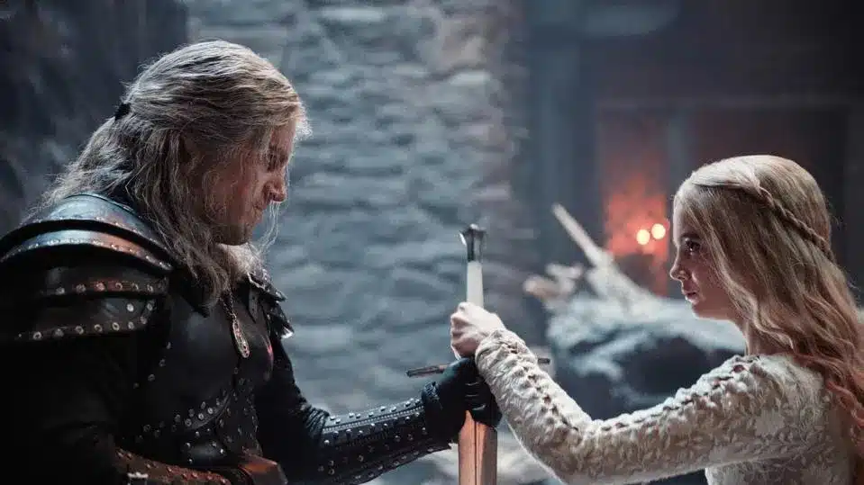 the-witcher-season-three-geralt-and-ciri-holding-sword